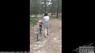jilling in the forest after riding her bike nude