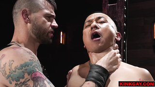 Buck Richards guides Zed Sheng down to his cock