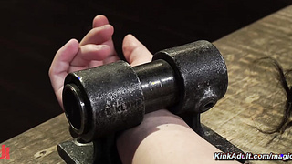 Slave is restrained in a straitjacket