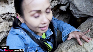 Public sex in a cave with Thai MILF slut