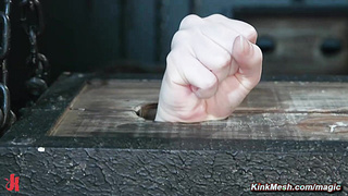 Blonde with locked hands and neck