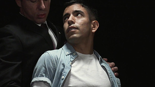 Master Reese drizzles oil on Milos lithe body