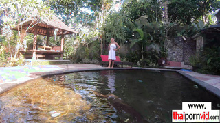 Amateur Thai teen masturbating in a pool