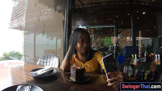 Cute Thai teen eats cake and rides cock