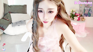 Sexy Petite Brunette Asian Babe teases Her Pussy