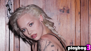 Sweet blonde posed in black lingerie