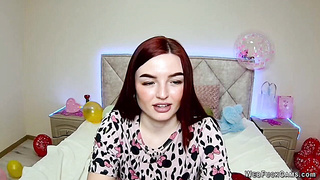 Cute redhead babe chats on webcam