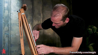 Black shemale in latex fucks artist