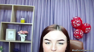 Redhead babe flashes big natural tits