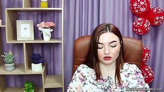 Redhead babe flashes big natural tits