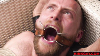 Johnny takes Peter inside and ties him to a chair