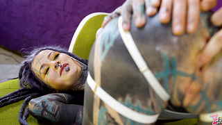 Tattooed hotties fuck each other with crazy toys