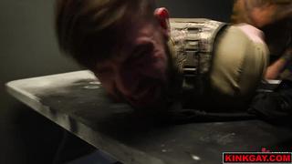 Rio has Buck Richards bound in rope bondage