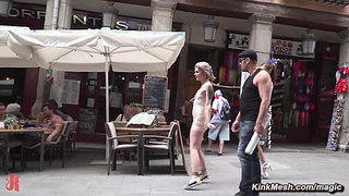 Blonde wrapped in plastic in public