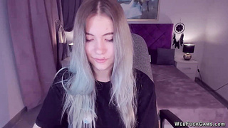 Blonde teen smoking and stripping off