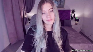 Blonde teen smoking and stripping off