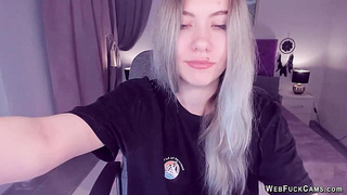 Blonde teen smoking and stripping off