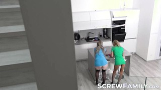 Busty blonde Bimbo Barbi and Dominika Curv enjoy three big cocks in the kitchen