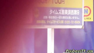 Peeing asians followed