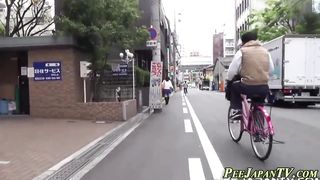 Peeing asians followed