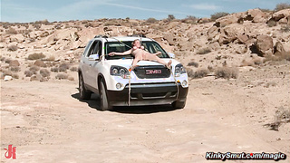 Man torments busty babes in a desert