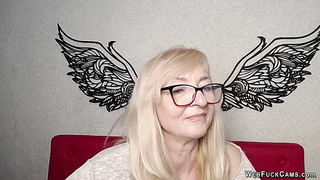 Blonde MILF with glasses on webcam