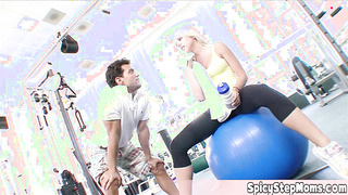 Cute blonde housewife having fun at the gym