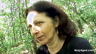 Hairy pussy granny fucks in the woods