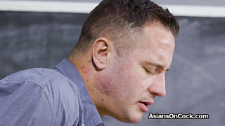 Asian spinner rides teachers cock by the chalkboard
