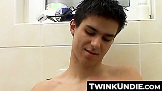 TwinkUndie.com - Horny Jake's wet and hard orange undies solo jerk off