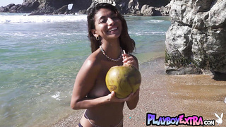 Flexible latina posing nude at the beach