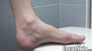 Short haired twink Patrick jerks off his uncut prick solo