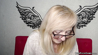 Blonde amateur MILF IngritSno with glasses on webcam