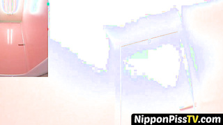 NipponPissTV.com - Teenage Asian redhead filmed pissing on the street for voyeurs