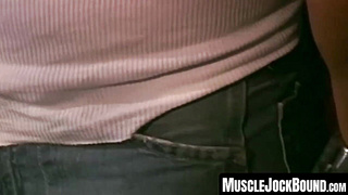 MuscleJockBound.com - Bound by chains, tattooed man in uniform endures rough and erotic domination