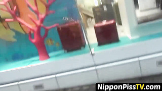 NipponPissTV.com - Japanese teen peeing until the whole floor is wet in public restroom