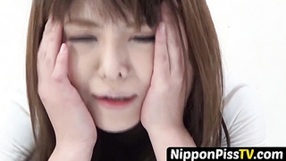 NipponPissTV.com - Oriental teen soaks her panties and the floor up with piss outdoors