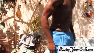 SwingYourBalls.com - Gay jock tugs his thick black cock and balls solo in the pool