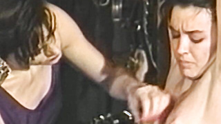 Lesbian babes spanked and tormented in vintage session