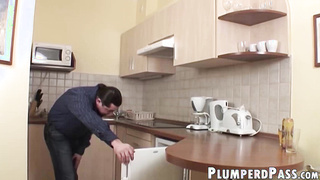 Curvaceous housewife sucks cock before kitchen riding