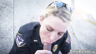 Busty police officers IR banged in the middle of the street