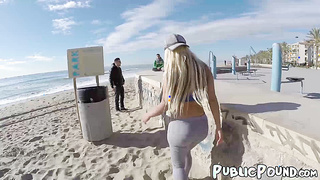 Blondie with an athletic body has sex outside on the beach