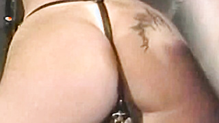 Busty blonde sub tied up for spanking in BDSM dungeon