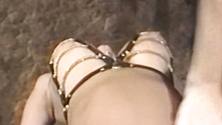 Busty blonde sub tied up for spanking in BDSM dungeon