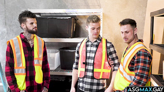 Warehouse workers shows the newbie the ropes