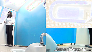 Hairy Asian babes close up caught on camera peeing in toilet