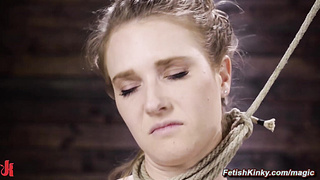 Bondage babe suspended and whipped