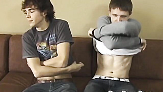 Long haired twink Logan Miles masturbates his thick cock