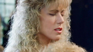 Pussy licking and dildo action with vintage busty lesbians