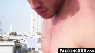 FalconsXXX.com - Gay studs engage in cock sucking and raw anal on a rooftop